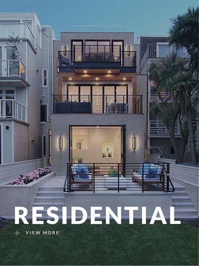Modern 3 story home with large windows, balconies, and large patio