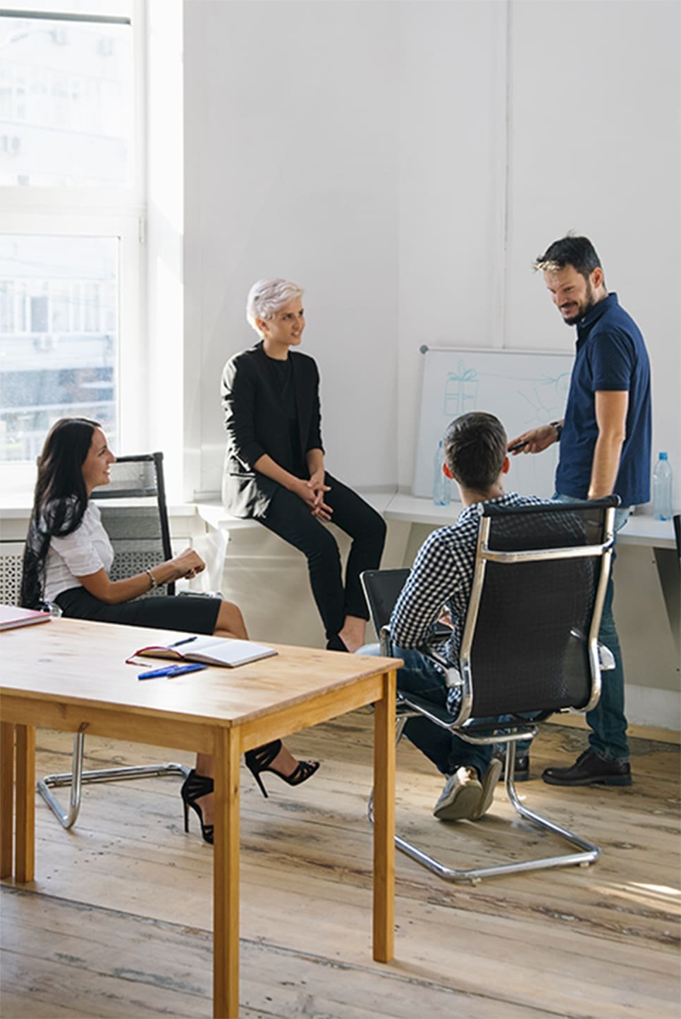 People discussing ideas in the office
